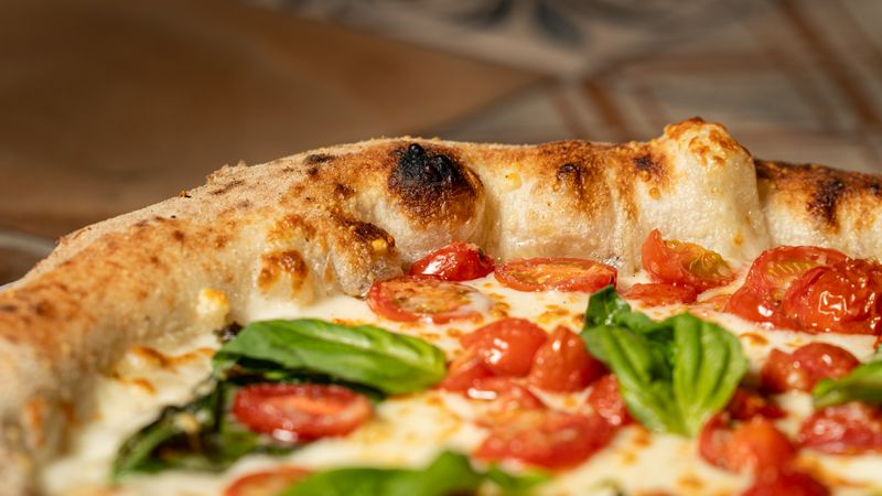 Classic margherita pizza promotion at Dewey's pizza